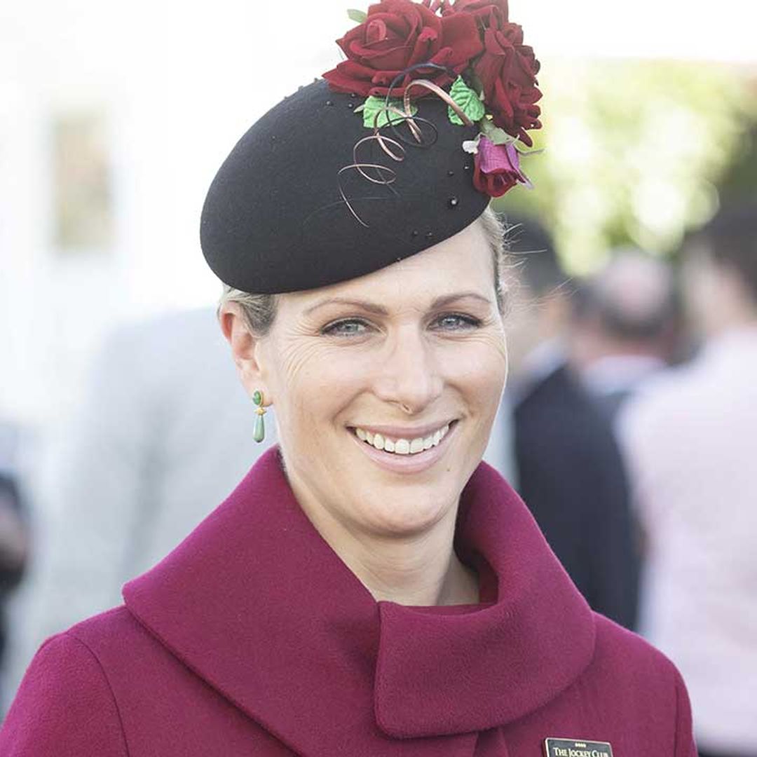 Zara Tindall looks regal in stunning coat during rare public outing with her father