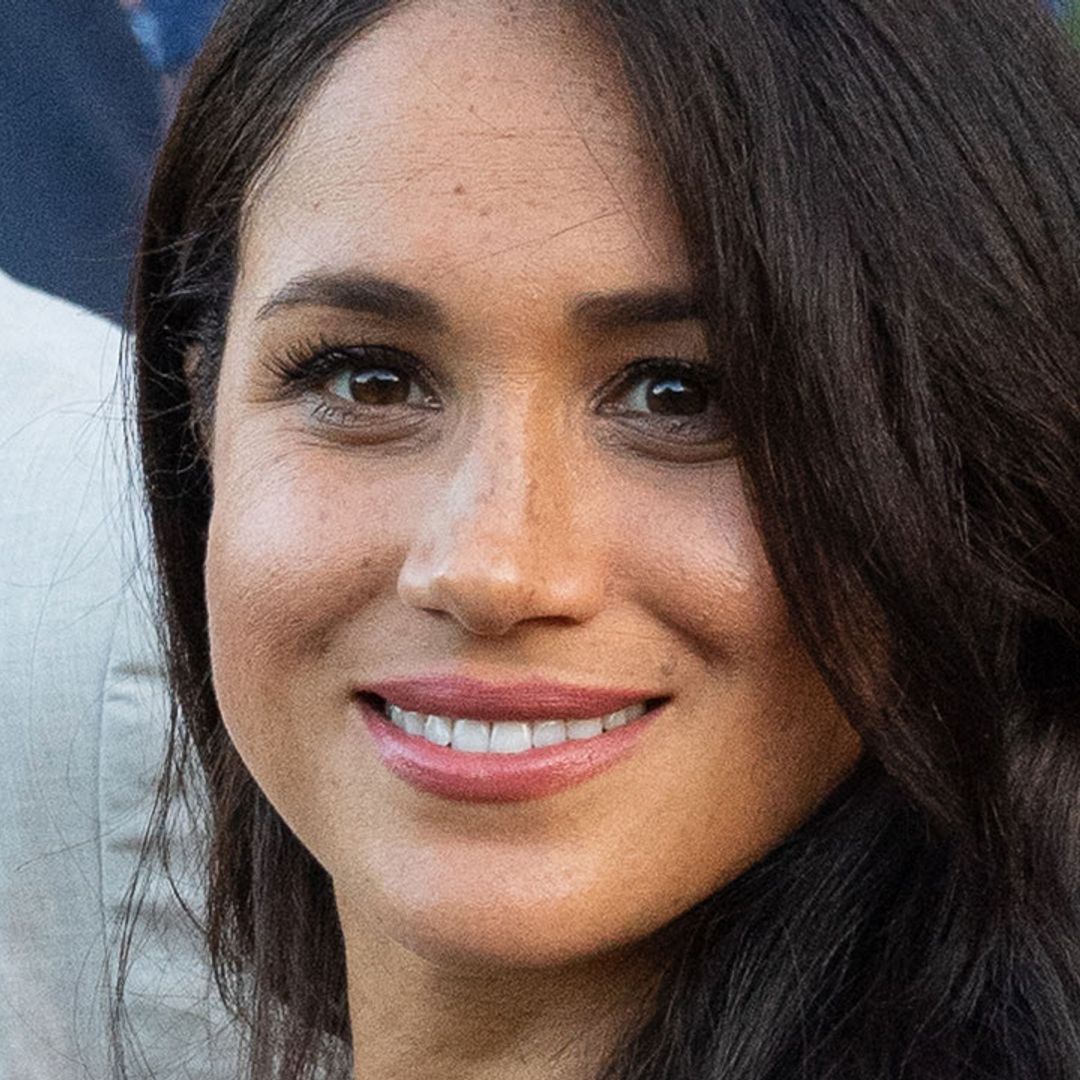 Meghan Markle rewears her Martin Grant striped maxi dress at Youth Reception during Royal Tour