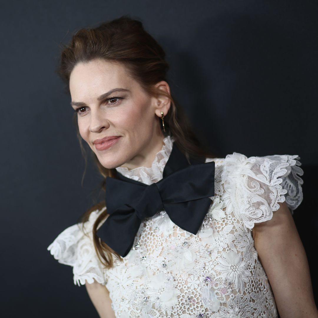 Emotional Hilary Swank talks life with baby twins and wells up with tears remembering late father