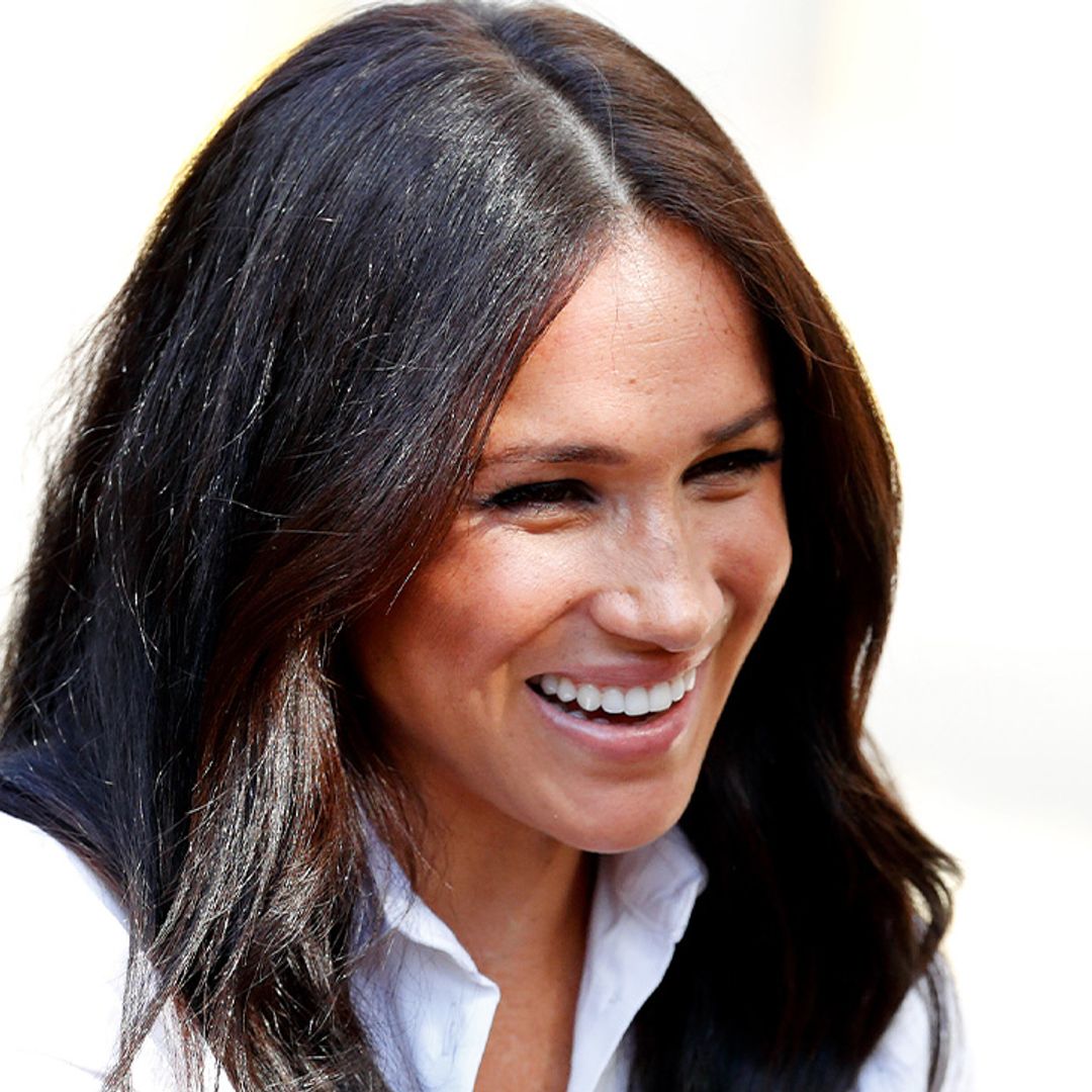 Watch Meghan Markle lark around with son Archie in endless backyard