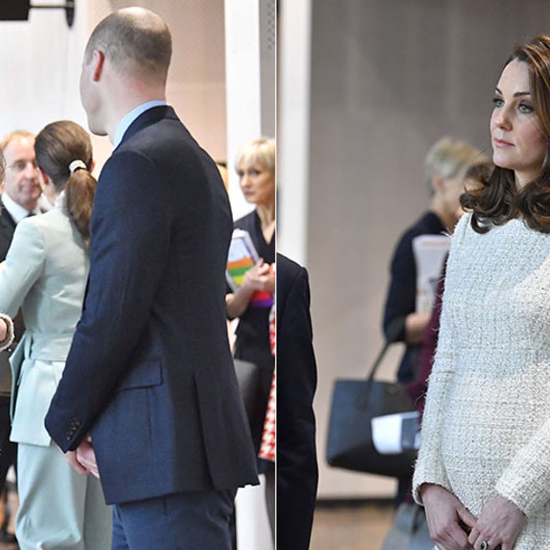 The sweet moment Kate was seen cradling her baby bump