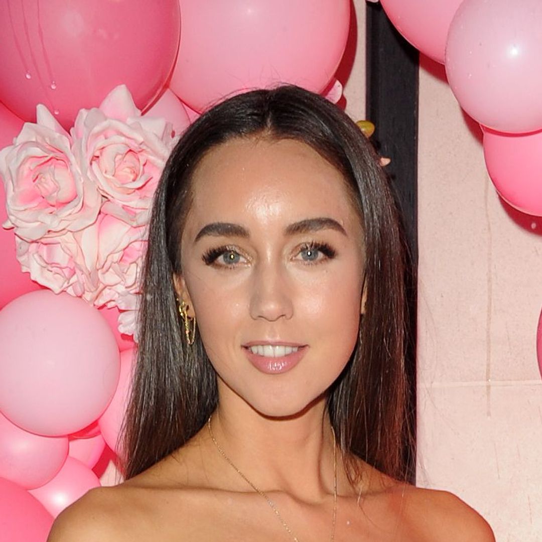 Emily Andre wows in figure-hugging jeans and waist-cinching crop top in candid video