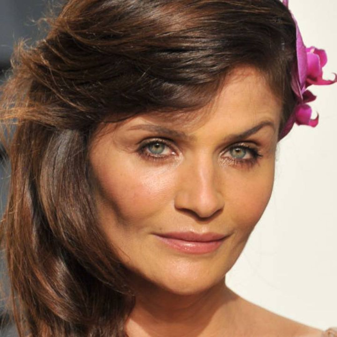 Helena Christensen looks unbelievably youthful in bold swimsuit with flirty detail