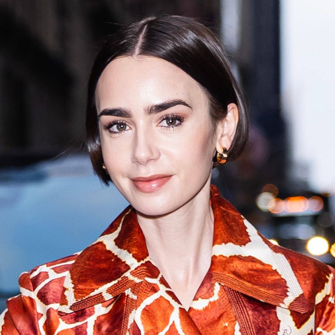 Lily Collins just made giraffe print a thing for AW25 in vintage trench coat and heels