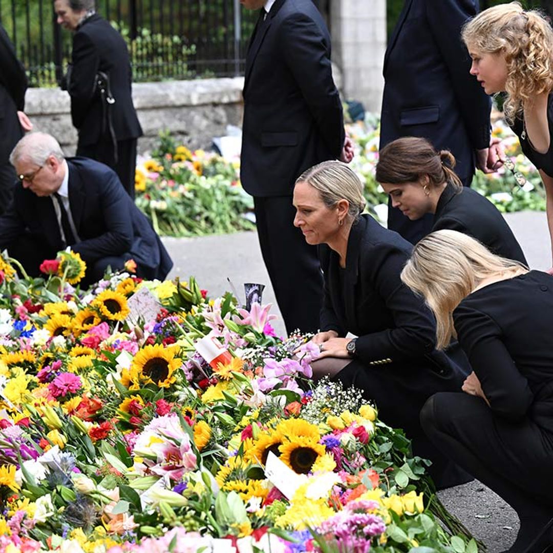 Princess Eugenie and Zara Tindall shed tears as they view floral tributes for the Queen
