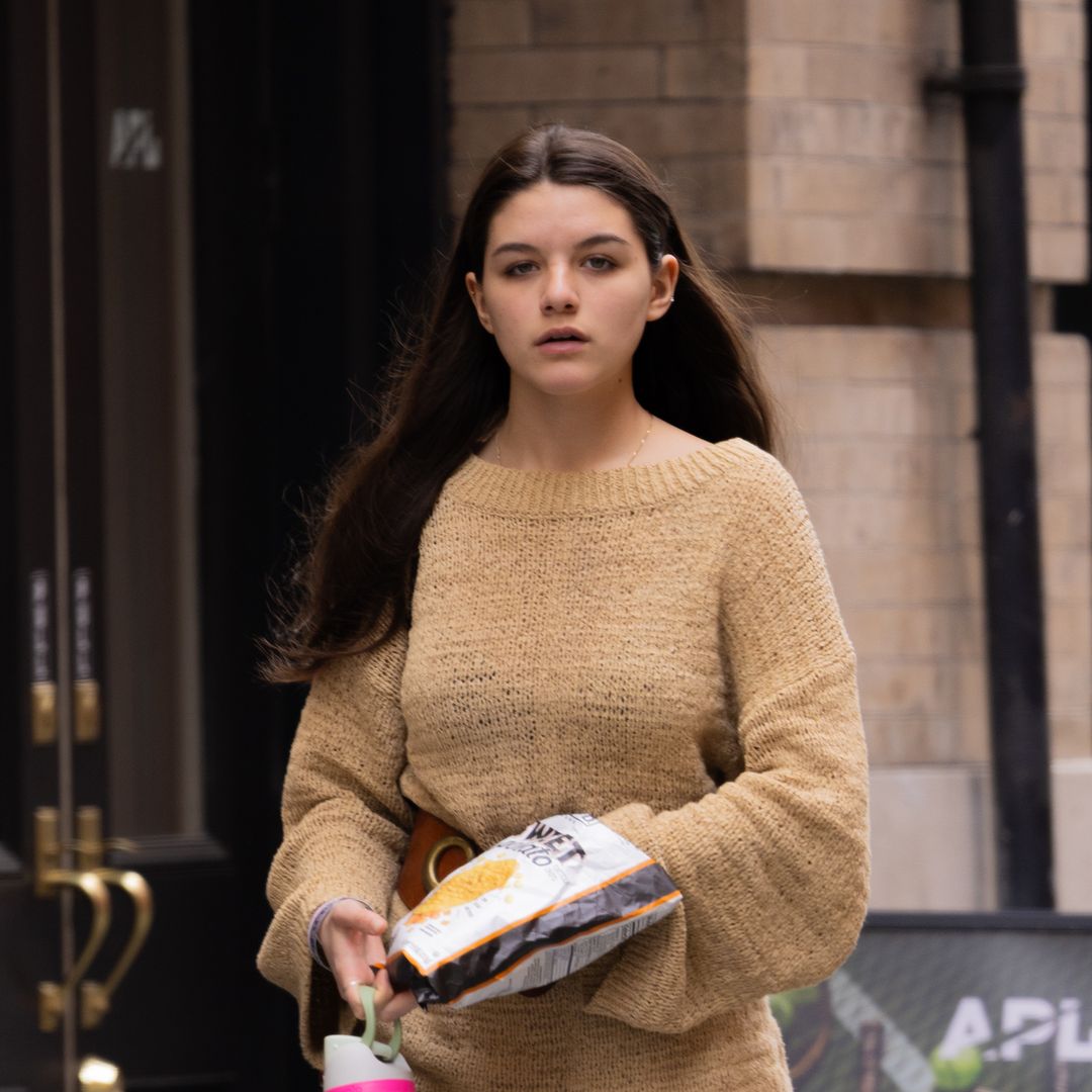 Katie Holmes and Tom Cruise's stunning daughter Suri, 18, is a vision as she steps out in flowing skirt and cowboy boots