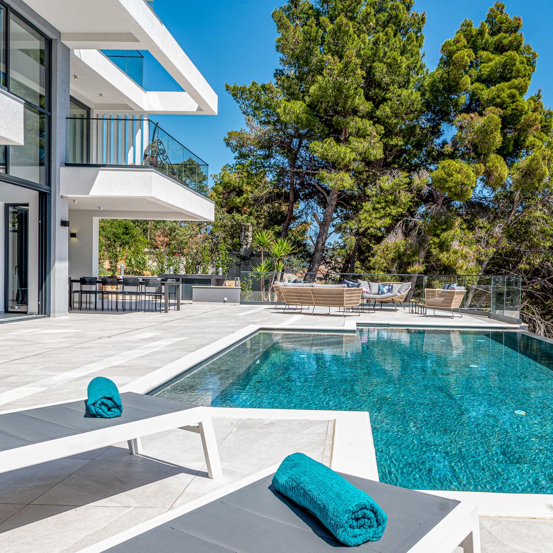 pool area luxury with ocean view Oliver's Travels