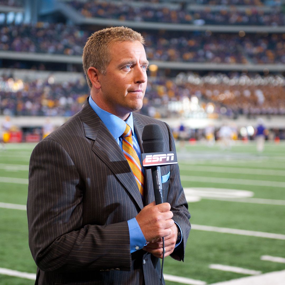 ESPN announcer Kirk Herbstreit on the field before a game between the Oregon Ducks and the LSU Tigers during the Cowboys Classic at Cowboys Stadium on September 03, 2011 in Arlington, Texas