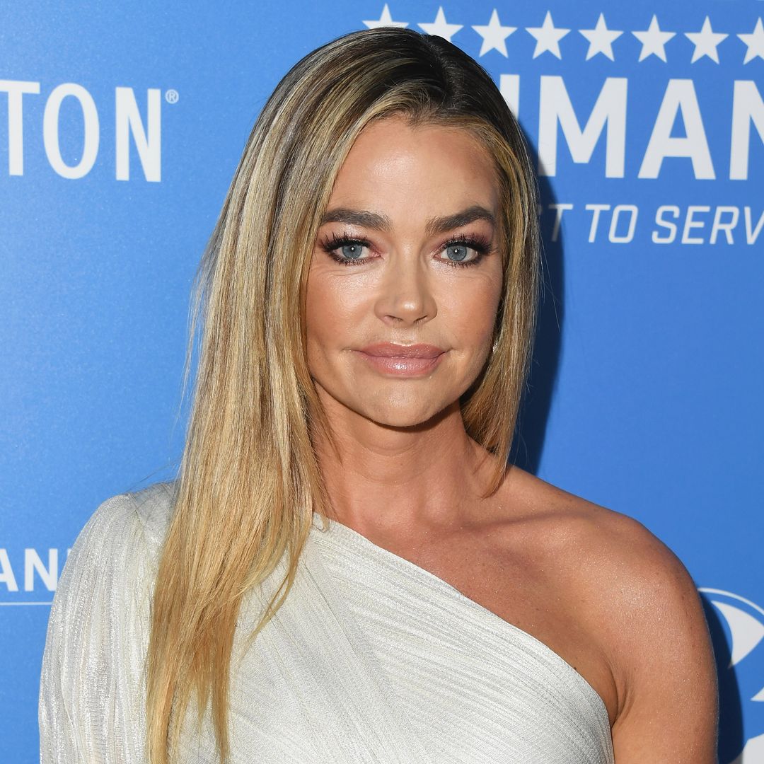 Denise Richards looks unrecognizable with wild hair transformation in bodycon dress