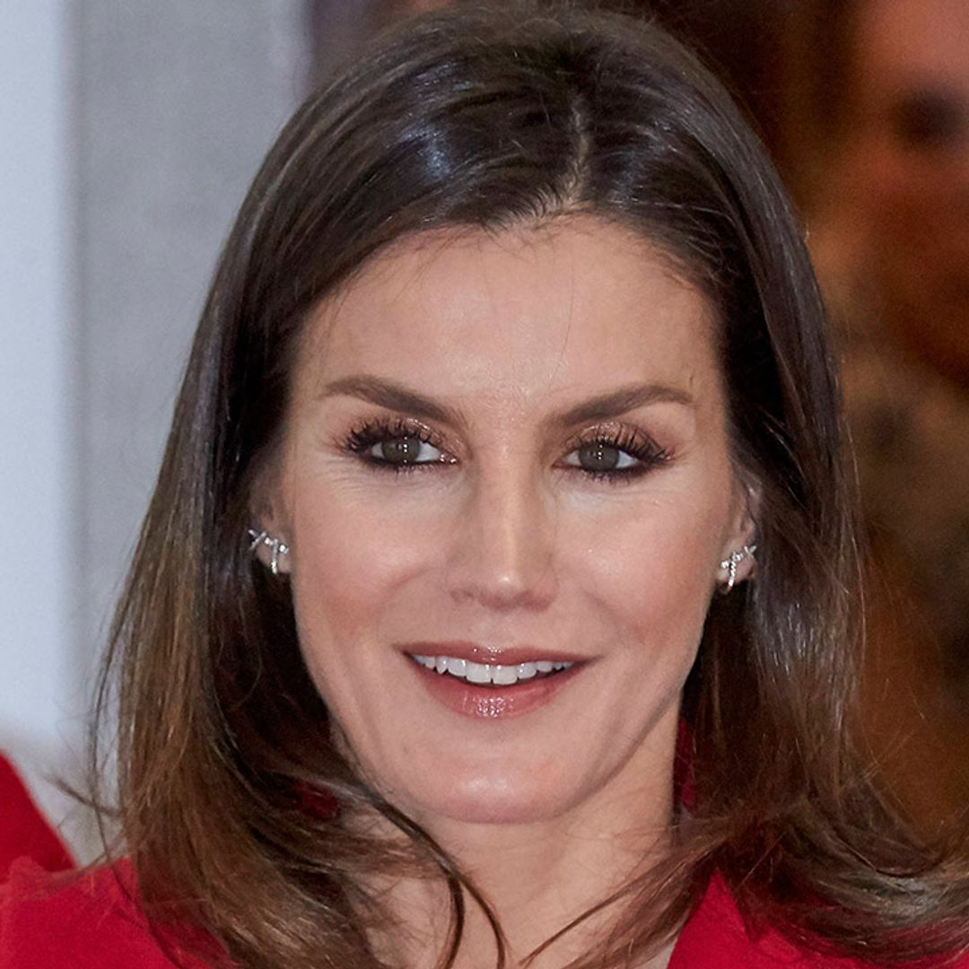 Va-va-voom! Queen Letizia is red hot in scarlet trouser suit