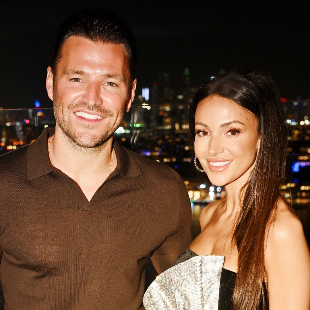 Michelle Keegan bares washboard abs in tiny crop top for swanky night out with Mark Wright