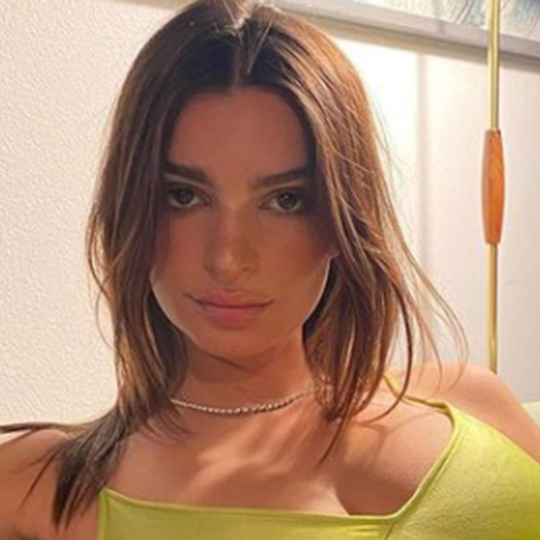 Emily Ratajkowski shows off baby bump in chic string swimsuit