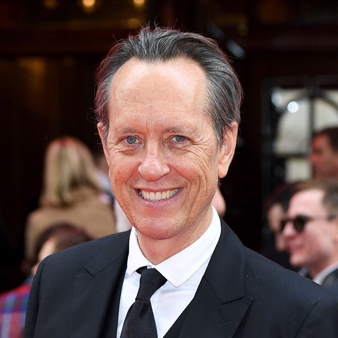Richard E. Grant cuddles up to wife Joan as they celebrate 37th anniversary