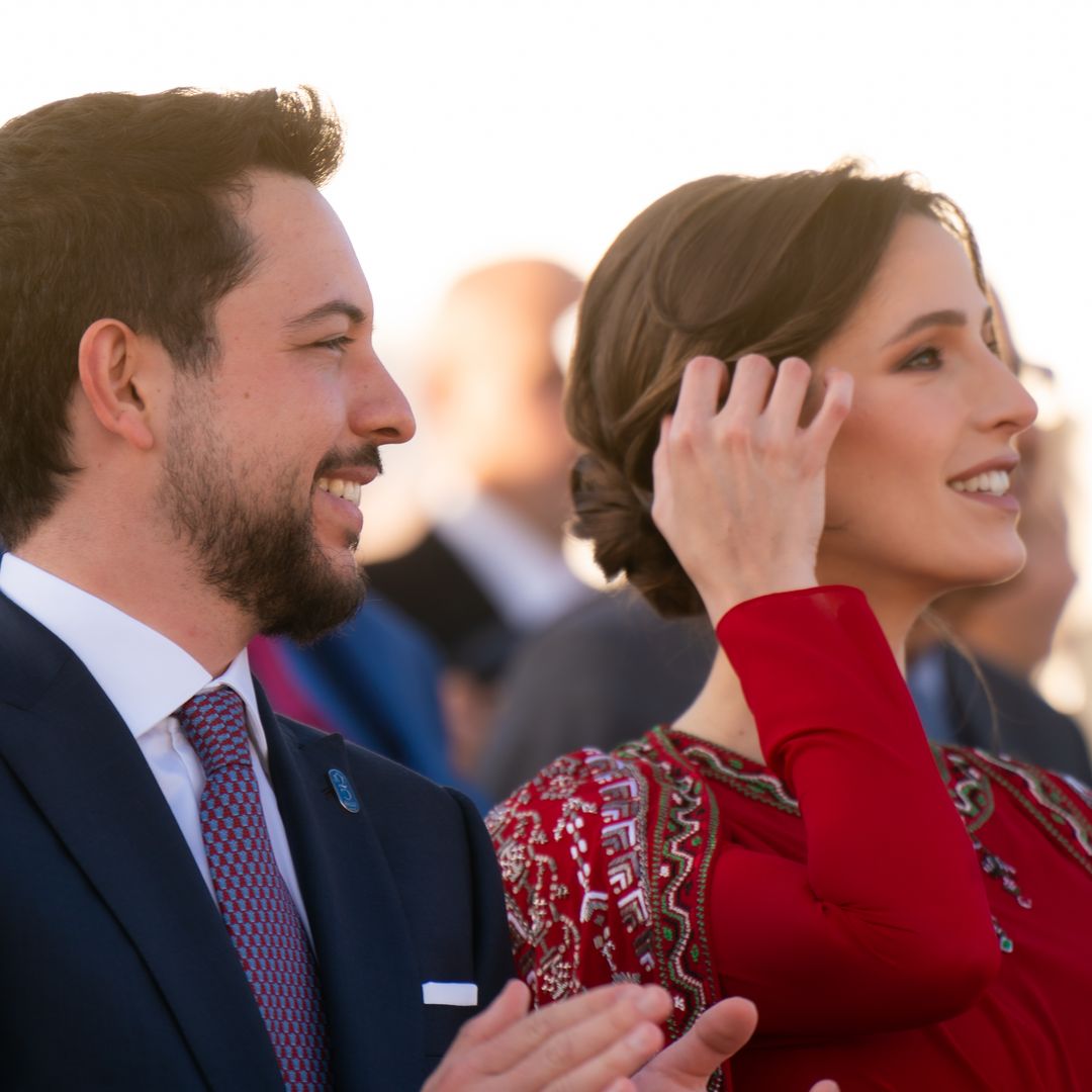 Princess Rajwa displays growing baby bump in stunning red gown at King Abdullah's Silver Jubilee