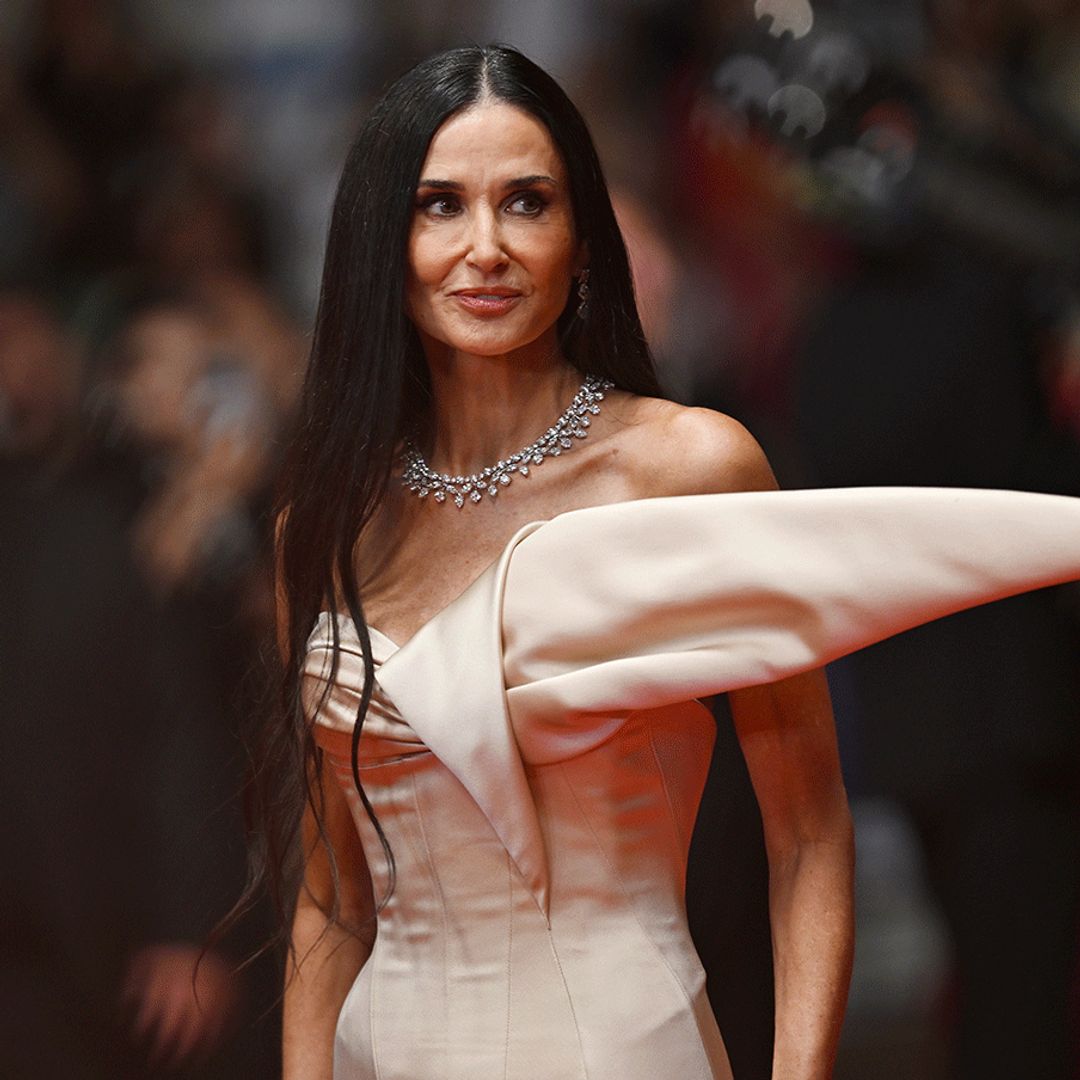 Demi Moore, 61, drops jaws in otherworldly satin gown and tumbling hip-length hair