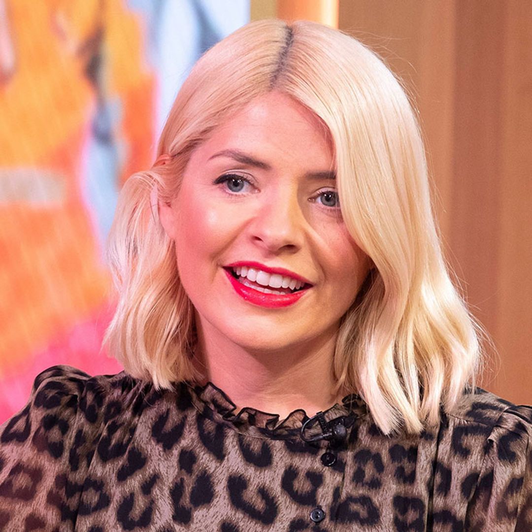 Oops! Holly Willoughby forced to staple her designer dress back together as it rips before TV appearance