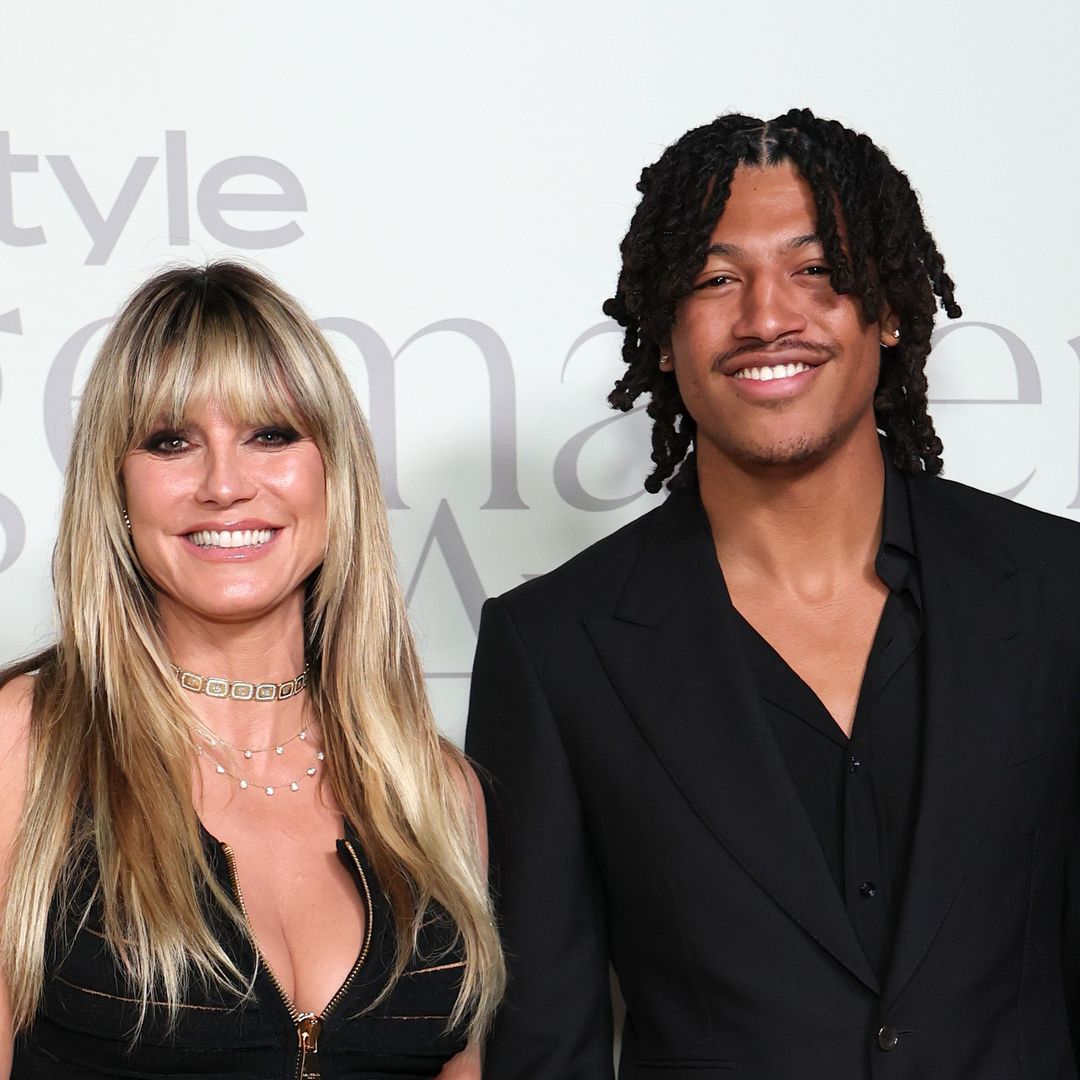 Heidi Klum wows in zip-up dress as she holds hands with model son on red carpet