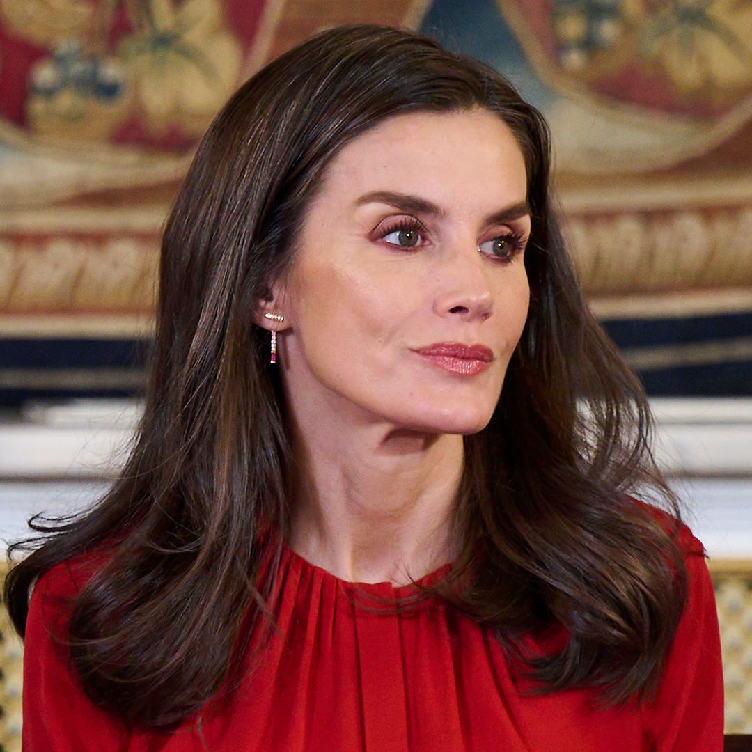 Queen Letizia stuns in fiery red ensemble alongside King Felipe