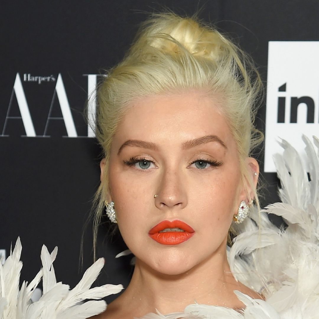 Christina Aguilera is red hot in brand new look as she makes long awaited return