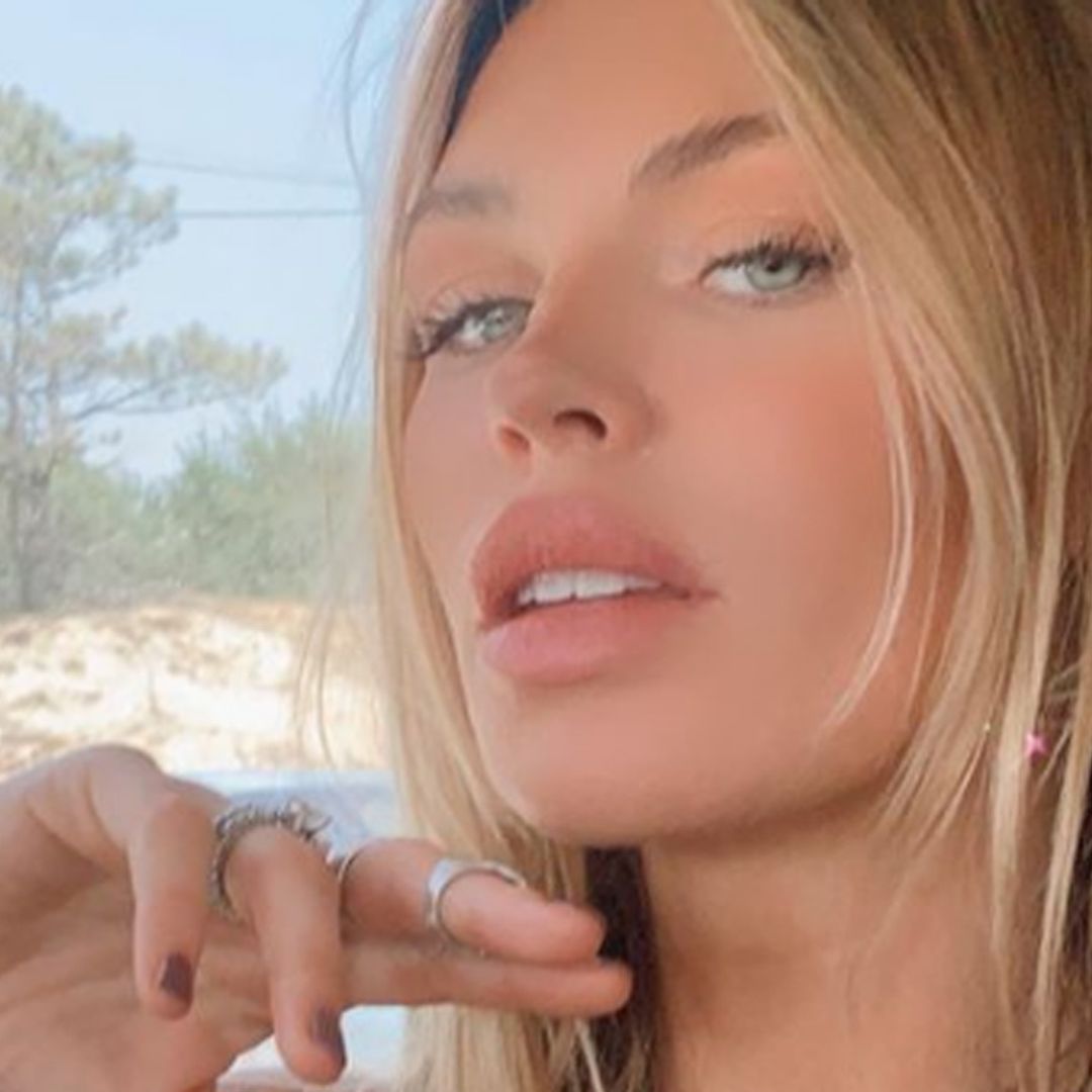 Abbey Clancy stuns in tiny string bikini as she cuddles up to husband Peter Crouch