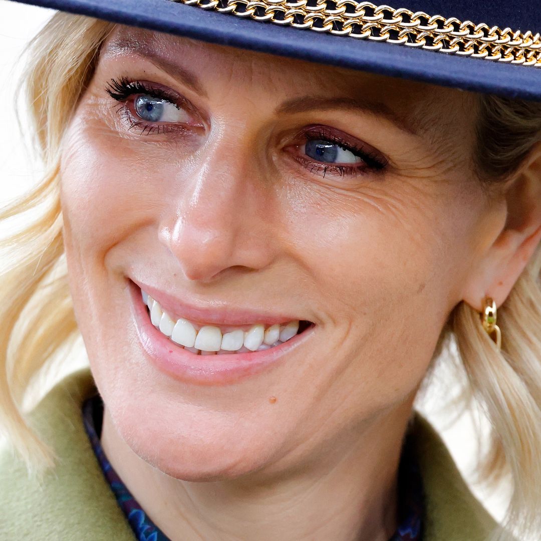 Zara Tindall surprises in a top-to-toe red look - complete with matching hat