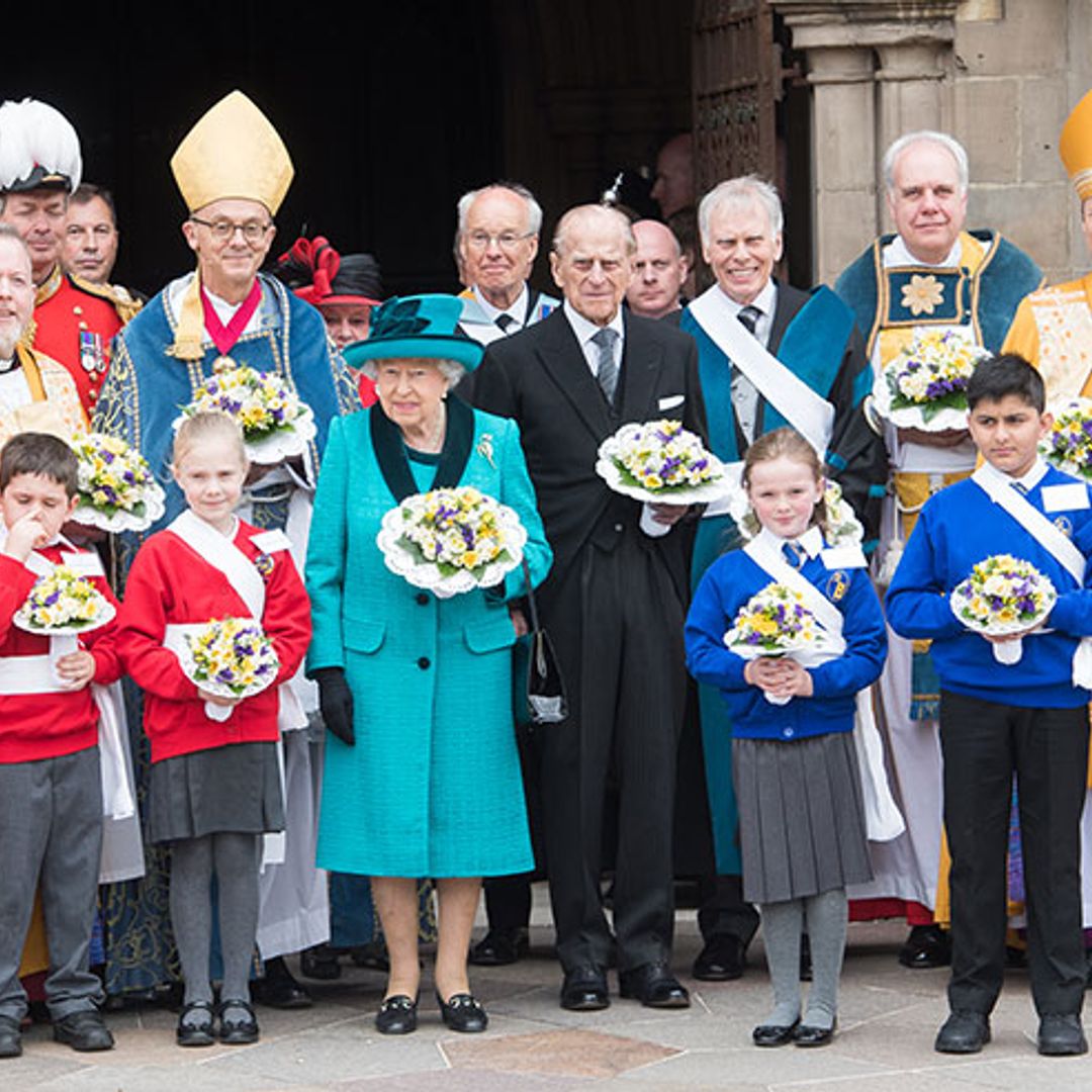 Why does the Queen hand out money on Maundy Thursday?