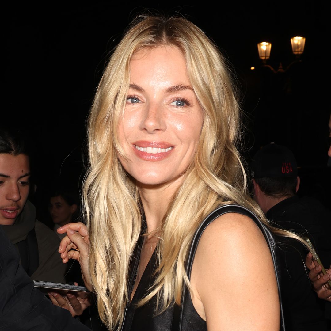 Sienna Miller stuns in leather crop top and low-slung jeans at Paris Fashion Week