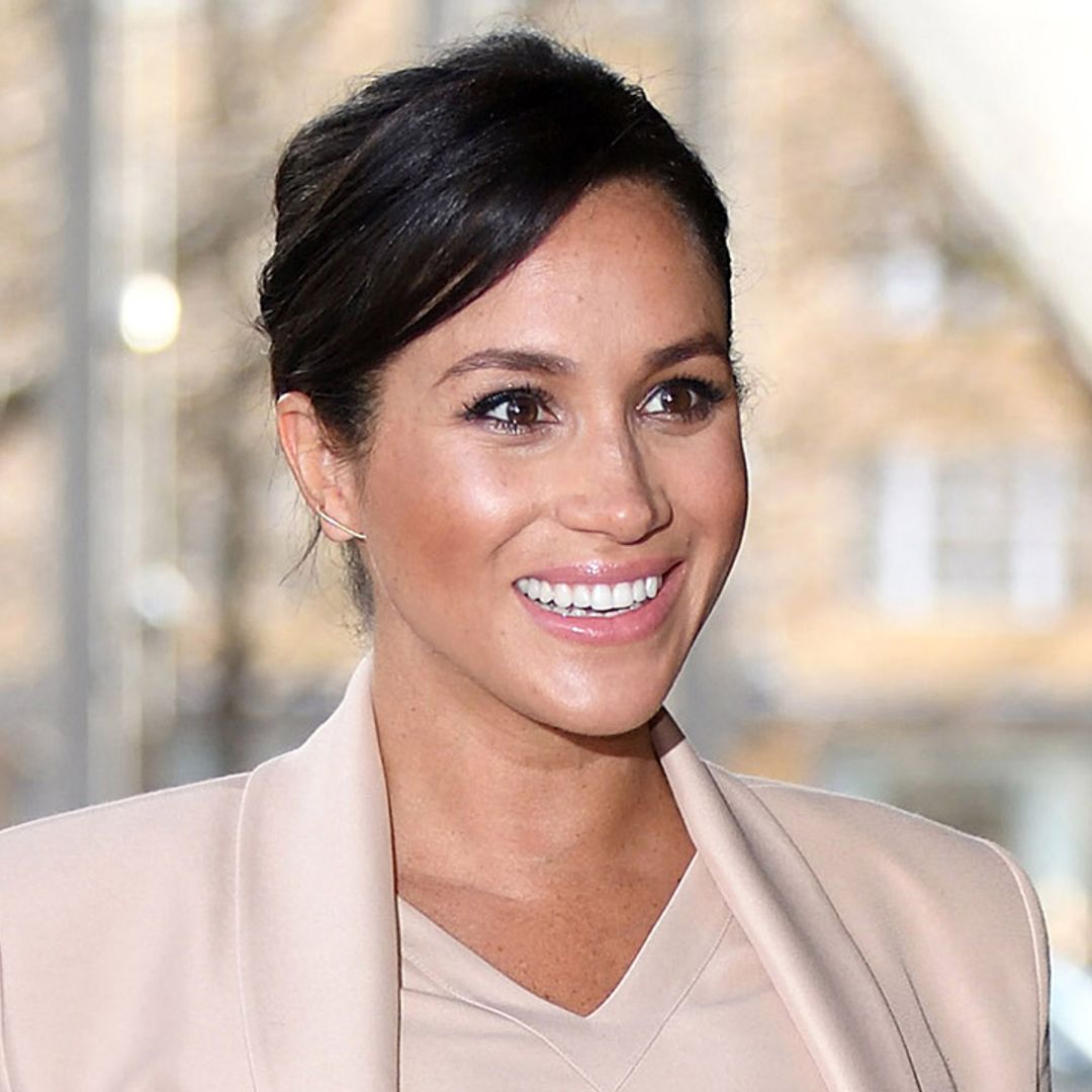 Meghan Markle looks flawless in leather trousers and turtleneck jumper