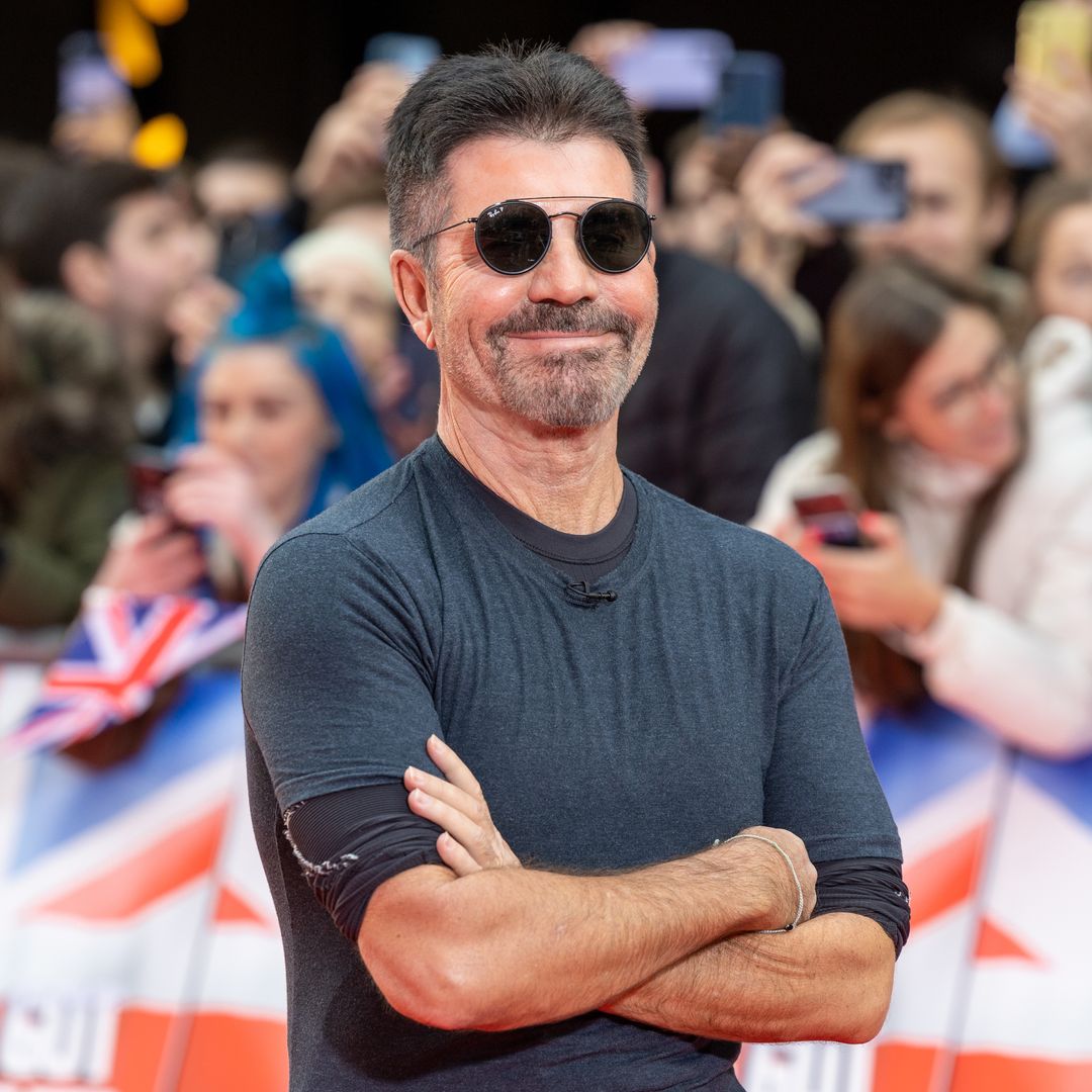 Simon Cowell looks unrecognisable with long hair in epic photo
