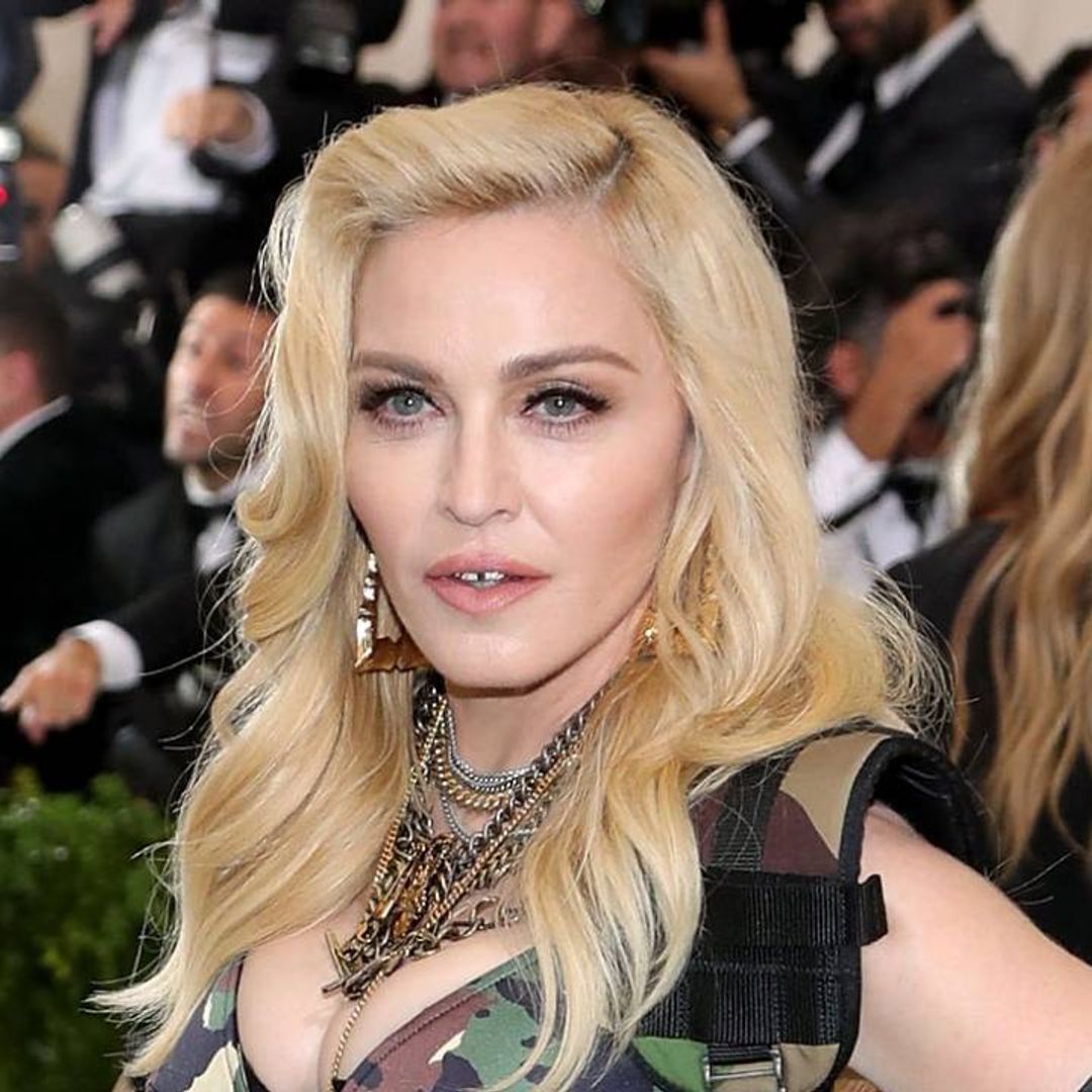 Madonna is hands-on mum as she and sons watch Harry's polo game