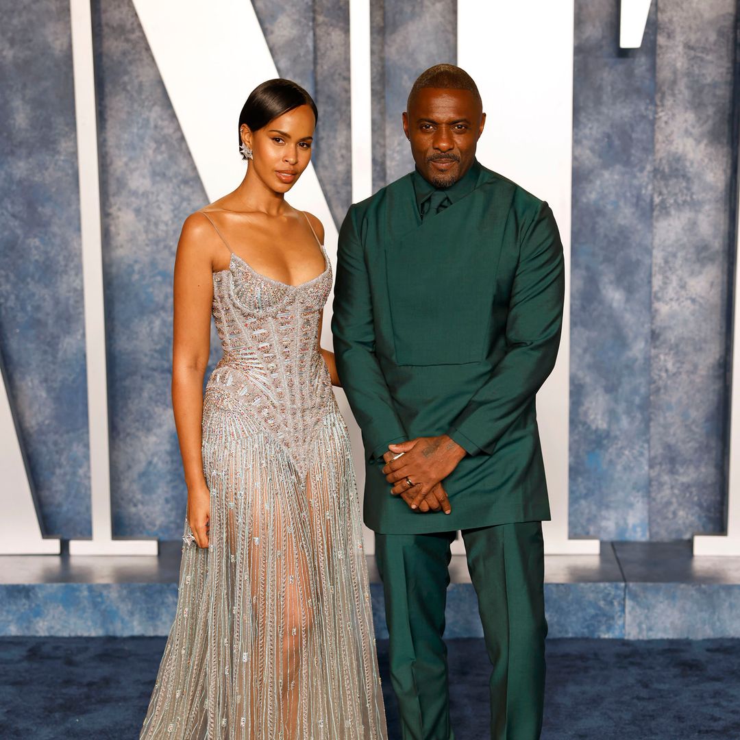 Idris Elba eclipsed by model wife Sabrina's appearance in very daring red dress