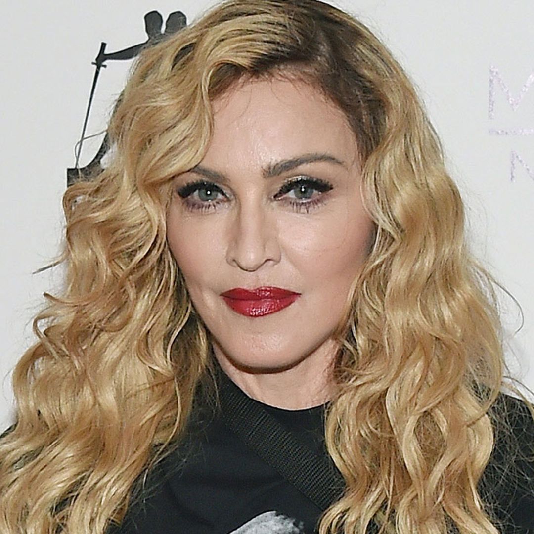 Madonna causes a stir in lacy lingerie in revealing new photos