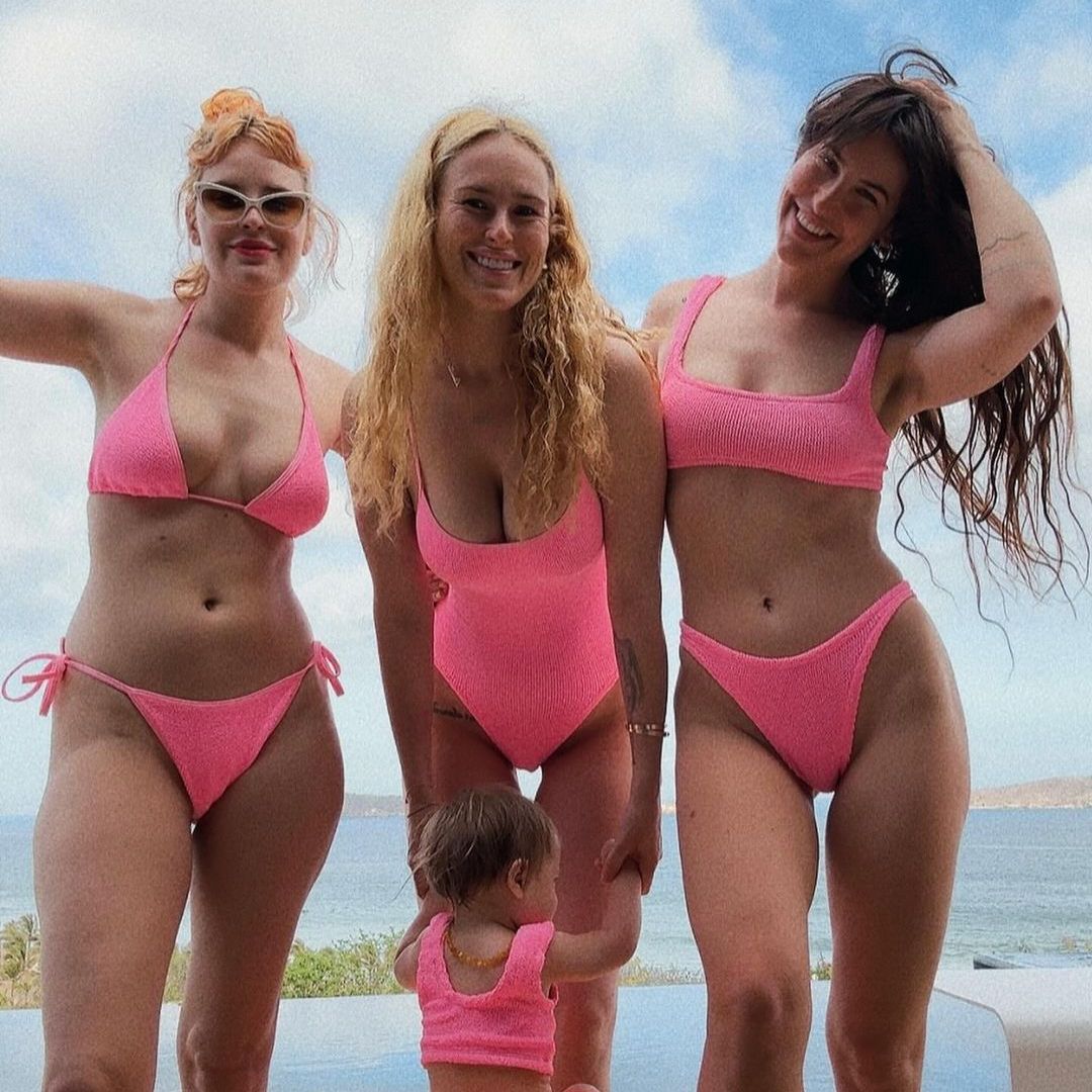 Rumer Willis and sisters twin in matching pink swimwear during tropical getaway