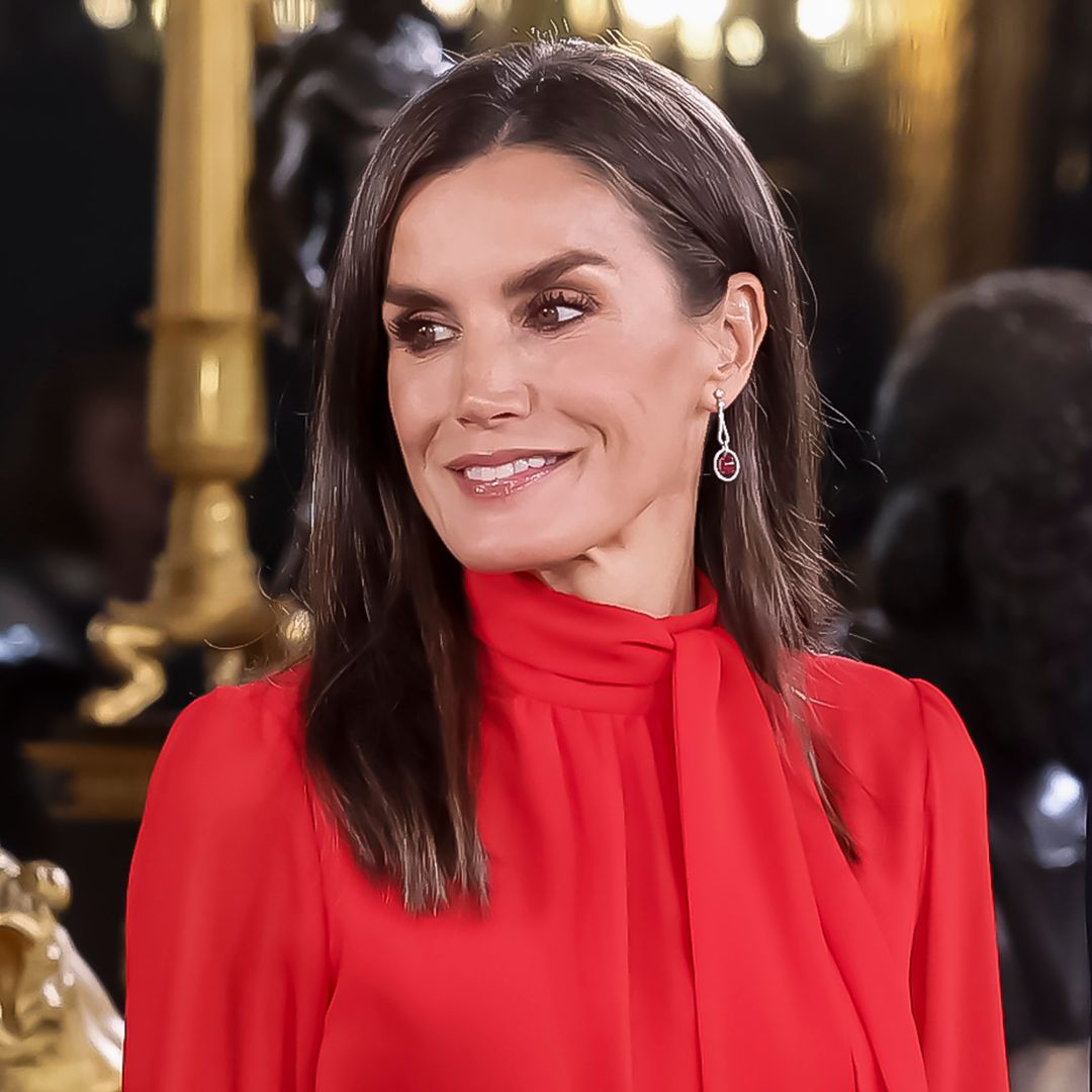 Queen Letizia is a total siren in waist-defining cut-out dress