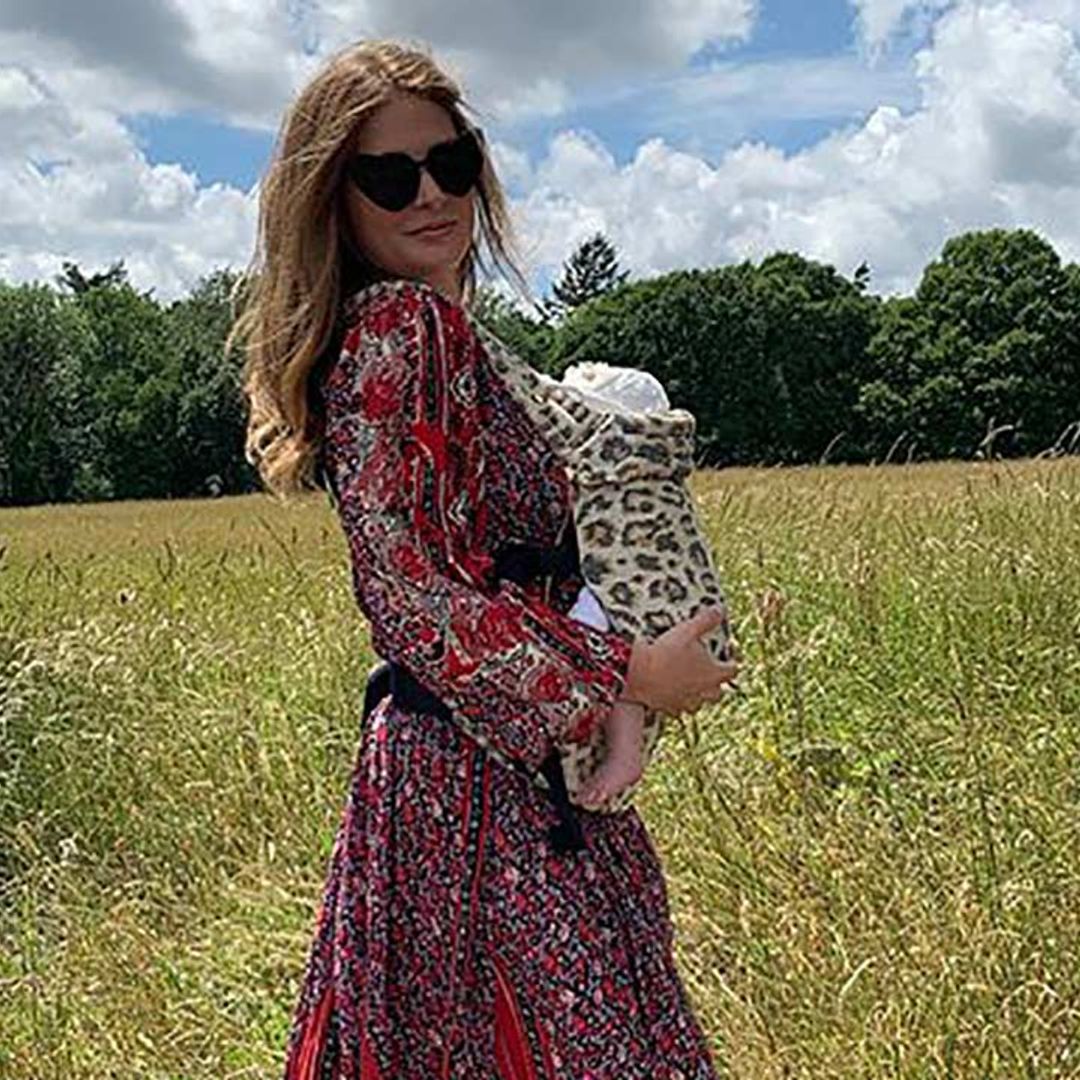 Millie Mackintosh takes baby Sienna on first trip – but her £682 baby sling gets all the attention