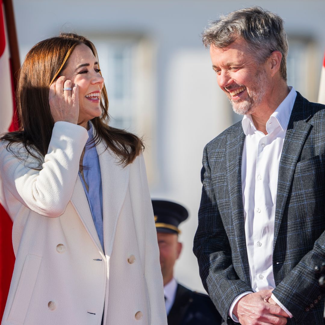King Frederik and Queen Mary share look of love as they are welcomed to new home
