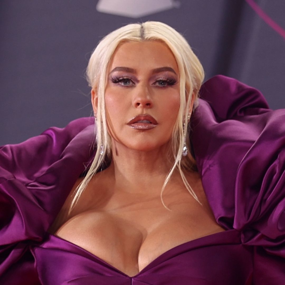 Christina Aguilera's legs go on for miles as she dons revealing blazer with nothing underneath