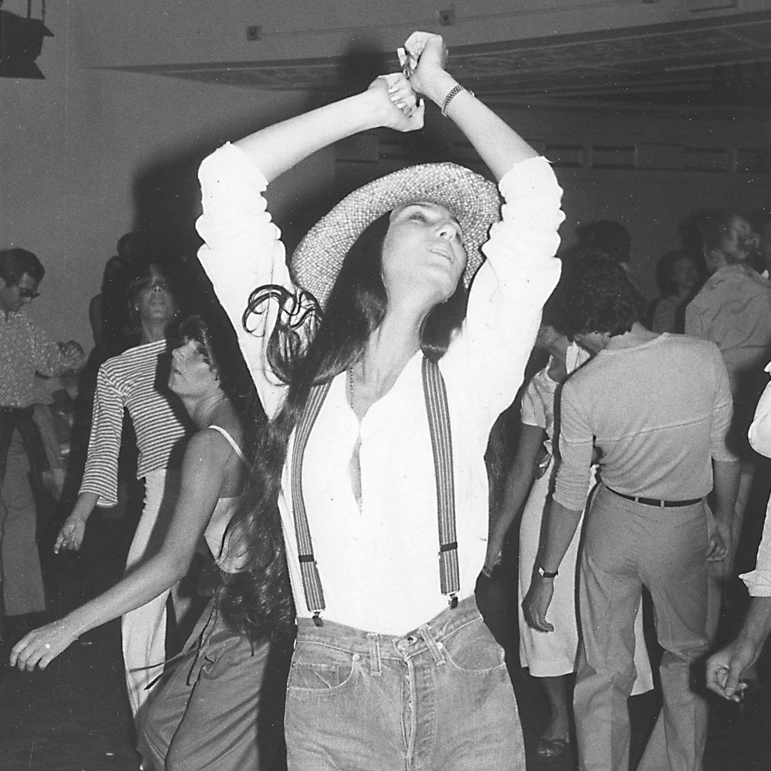 American singer and actress Cher (born Cherilyn Sarkisian) dances at Studio 54, New York, New York, July 26, 1977