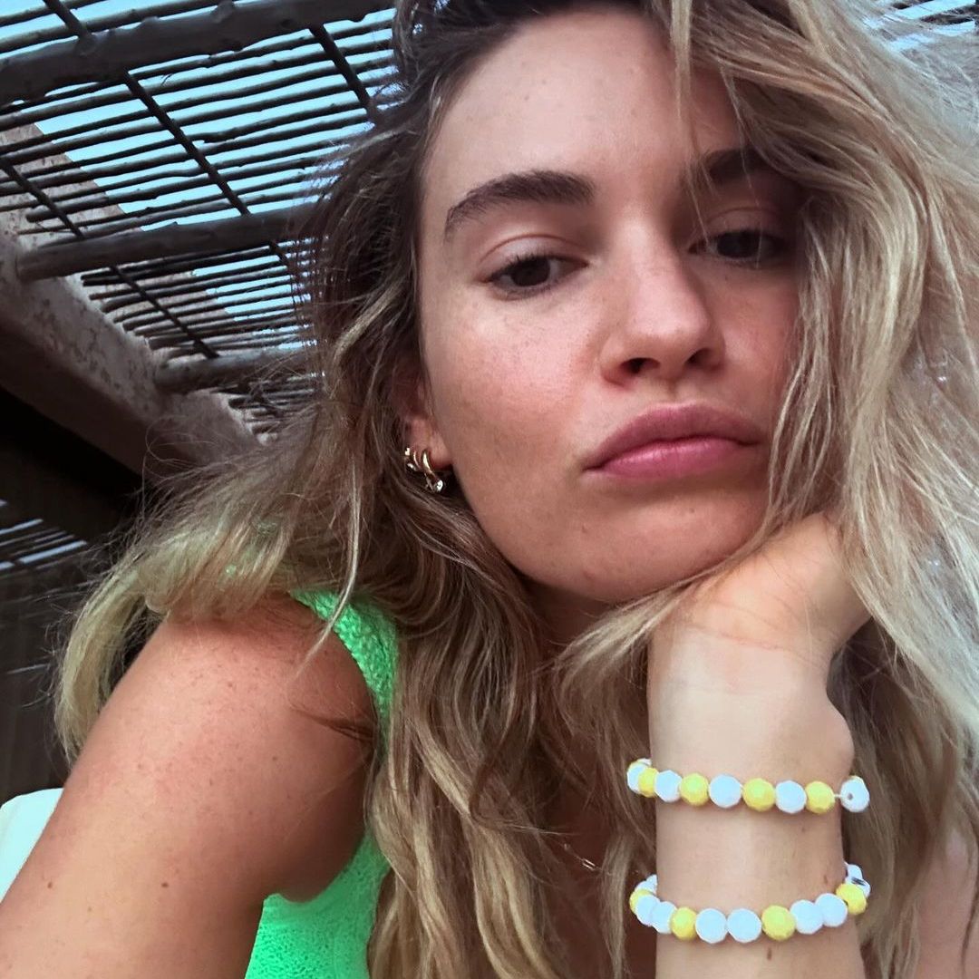 Lily James is the ultimate beach babe in 2025's must-have swimsuit