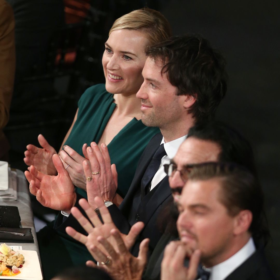 The couple sat clapping while attending the SAG awards in 2016
