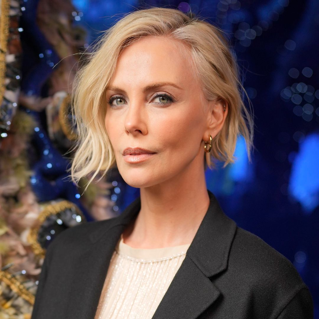 Charlize Theron stuns as she channels Elizabeth Hurley in show-stopping split dress