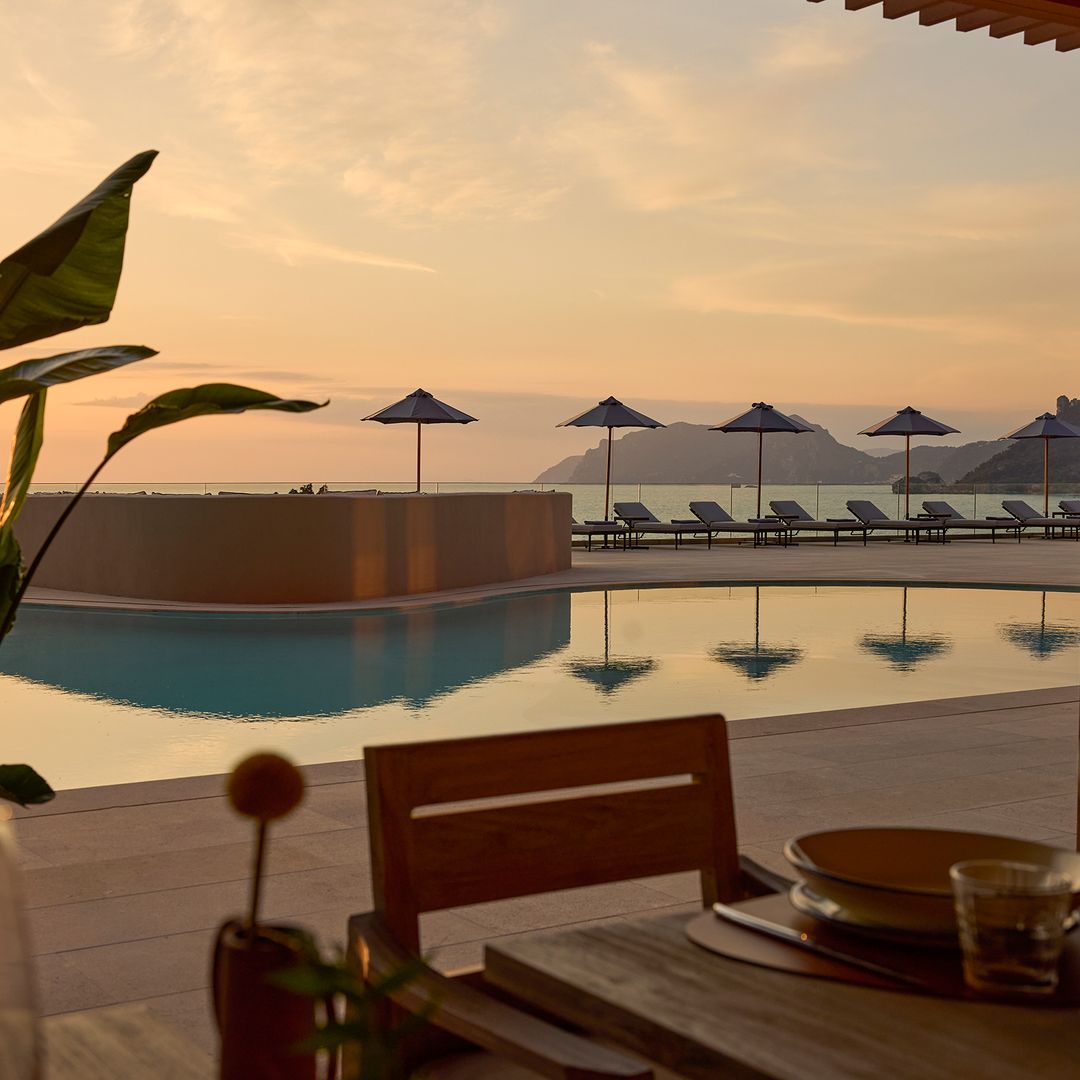 exterior shot of pool and restaurant at corfu hotel