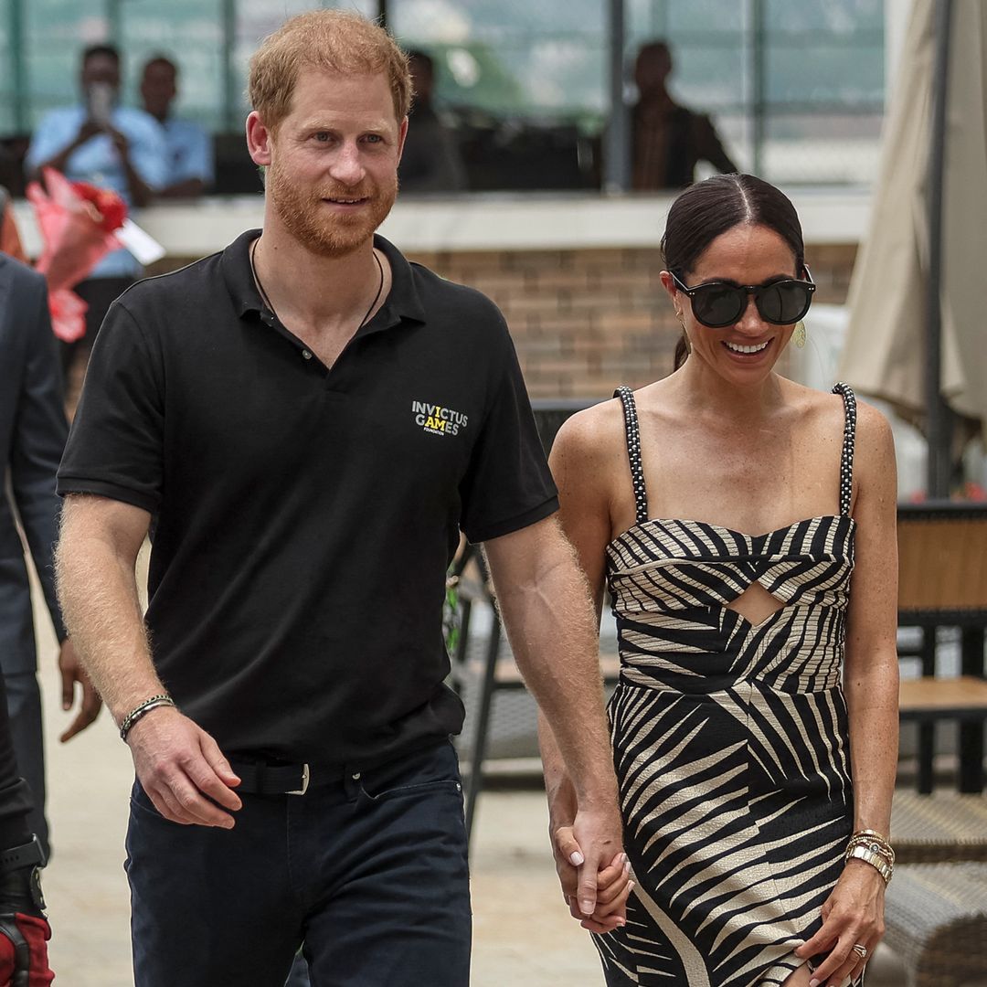 Meghan Markle stuns in thigh-split silk dress for day two of Nigeria trip