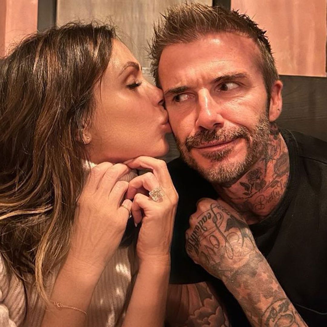 Victoria Beckham fawns over David Beckham as he treats her to the ultimate welcome home surprise