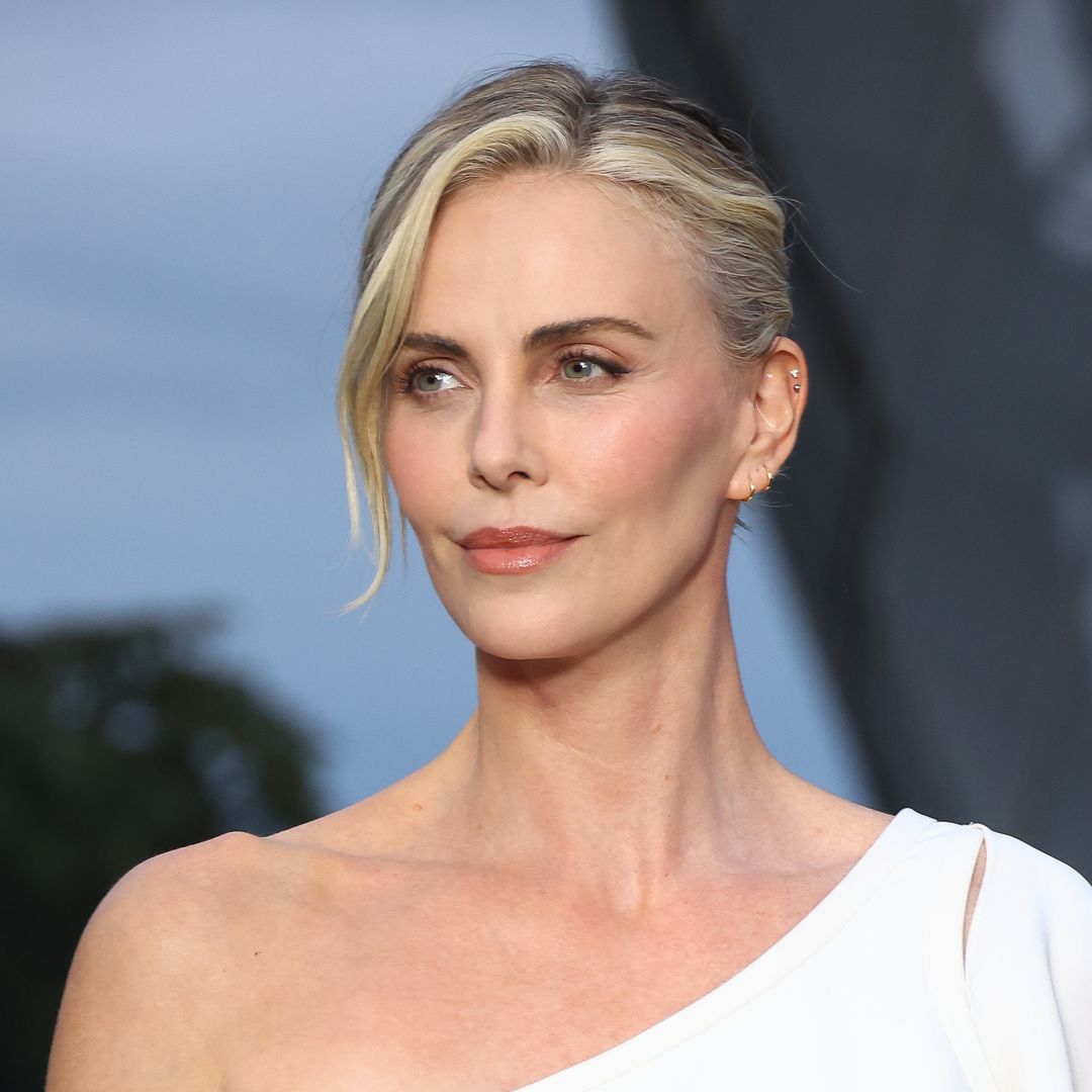 Charlize Theron rocks Parisian chic in unforgettable white dress
