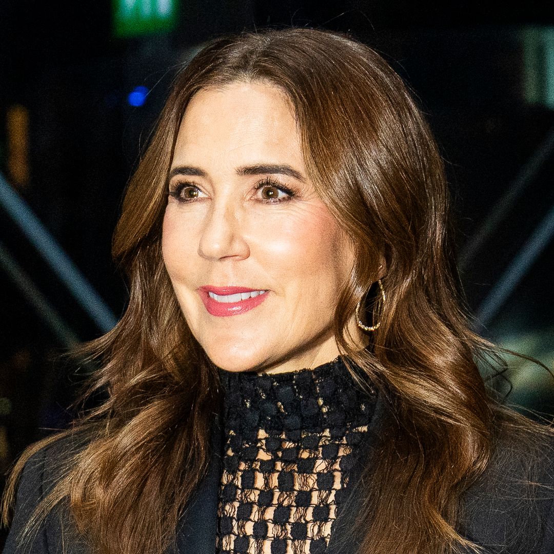 Queen Mary goes 'edgy' in sheer lace top for concert outing