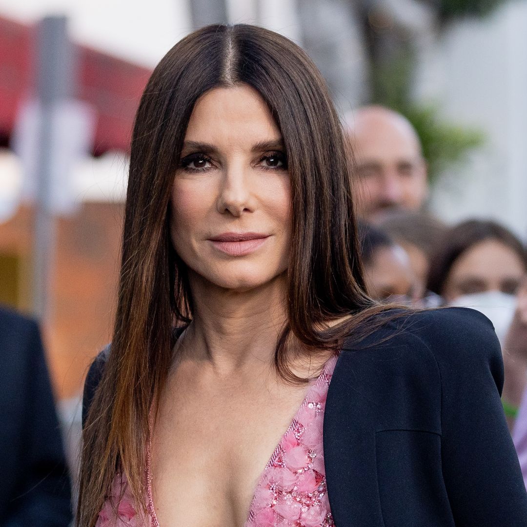 Sandra Bullock glows as she opens doors into huge family home with her two kids for rare TV appearance