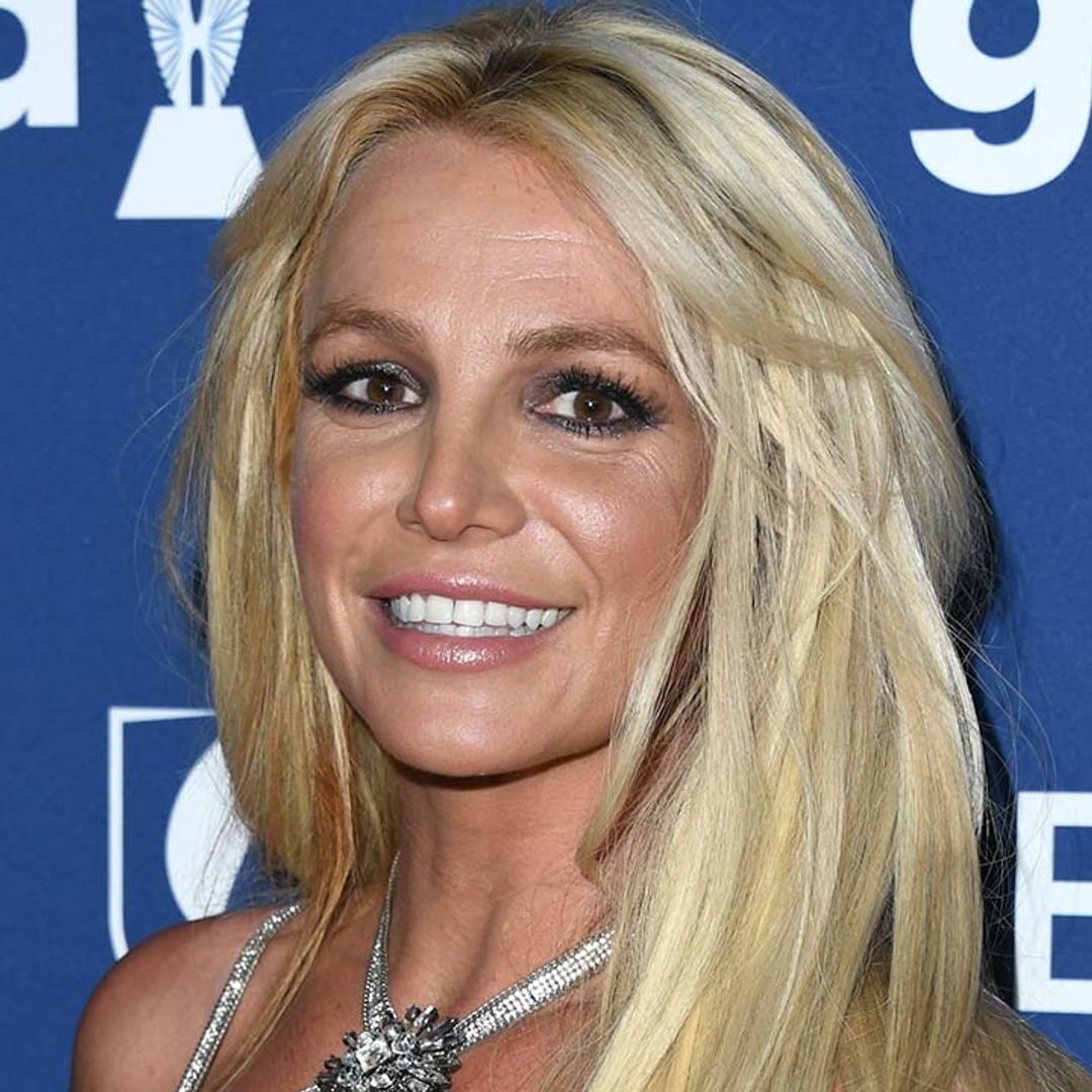 Britney Spears wows in neon swimsuit and pink hair transformation