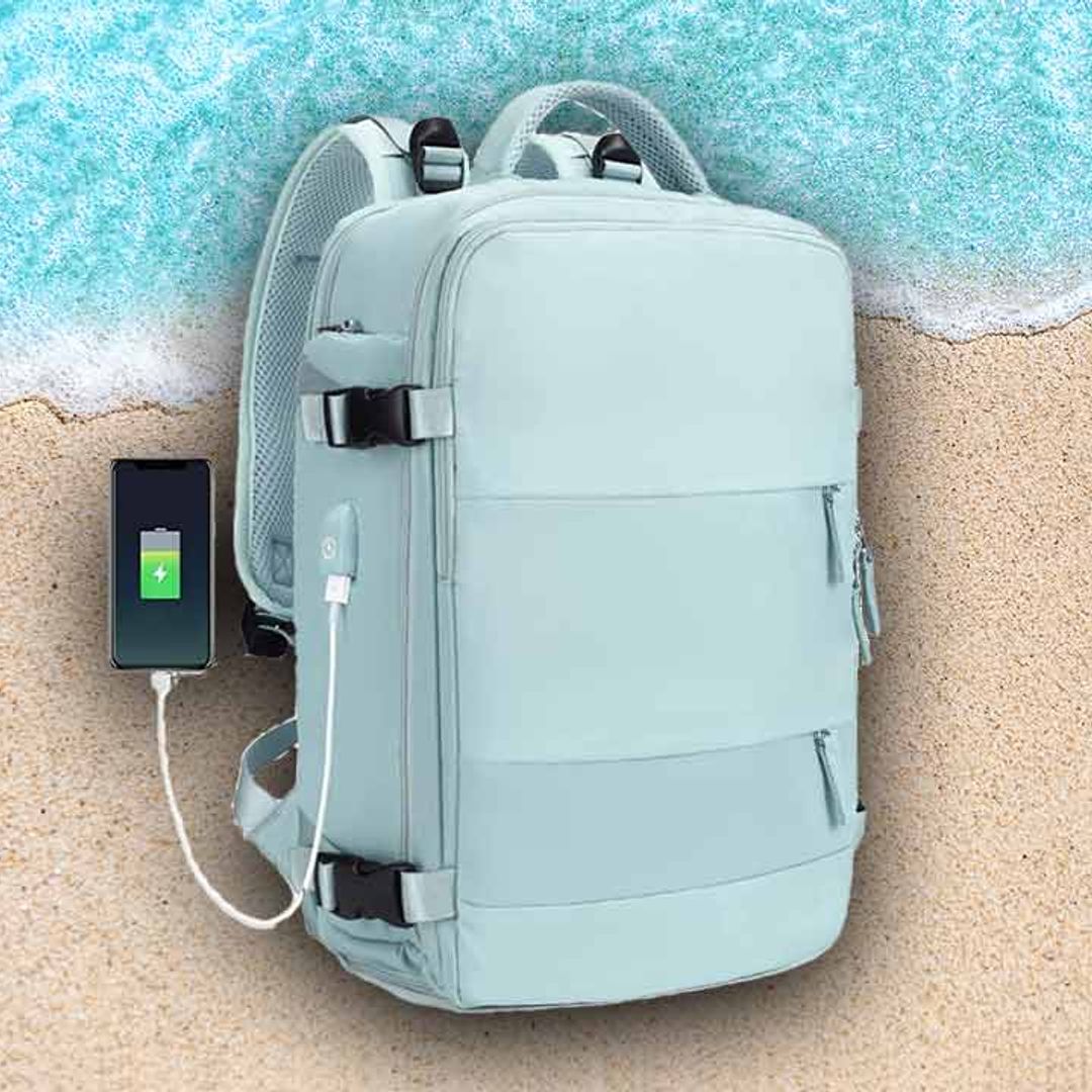 This genius travel backpack with phone charger has over 1,200 positive reviews on Amazon