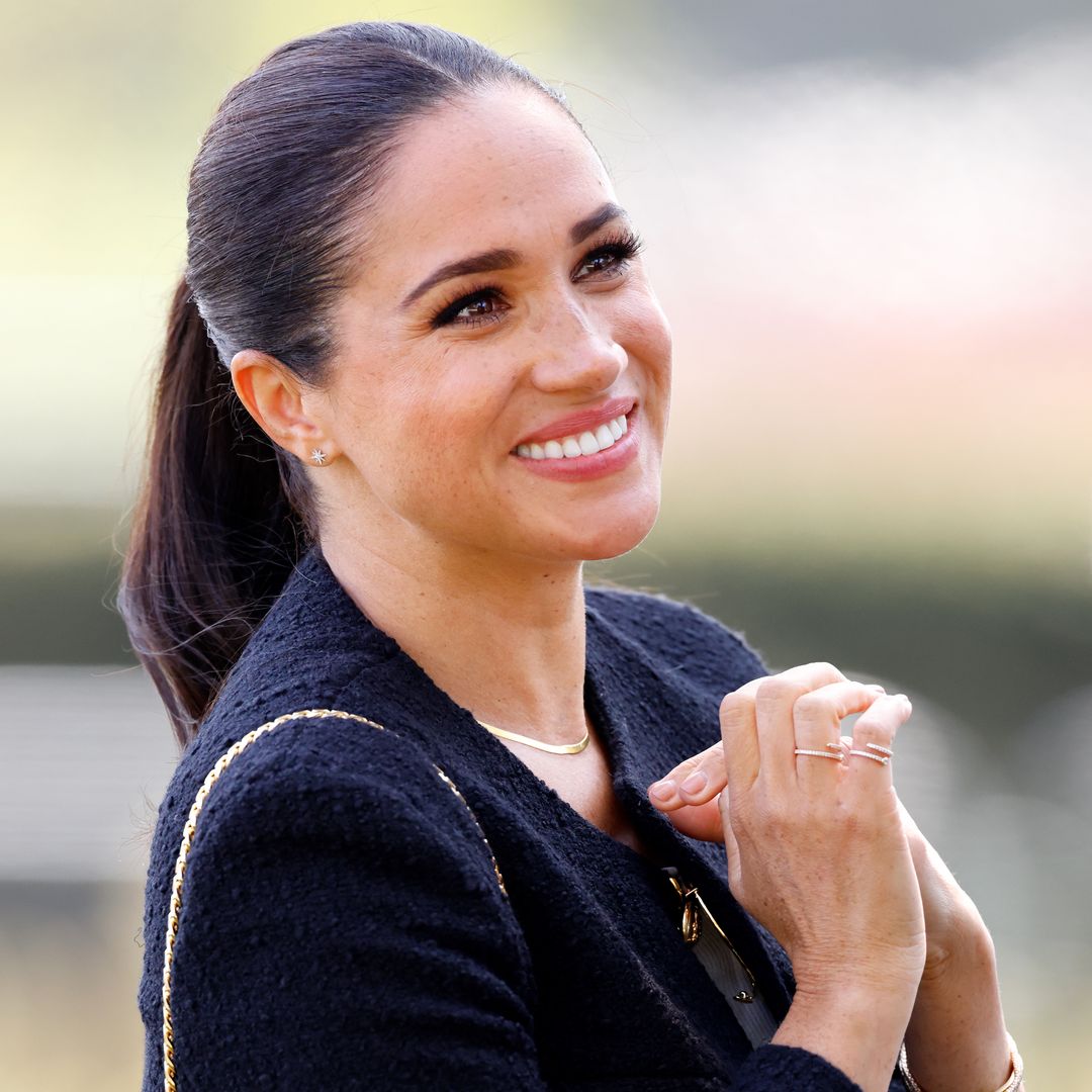 Meghan Markle scoops up Archie for the biggest hug in unearthed family moment